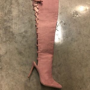 Pink suedes thigh high lace up boots